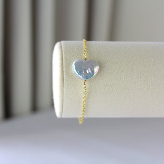 Hartparel met gouden ketting armband