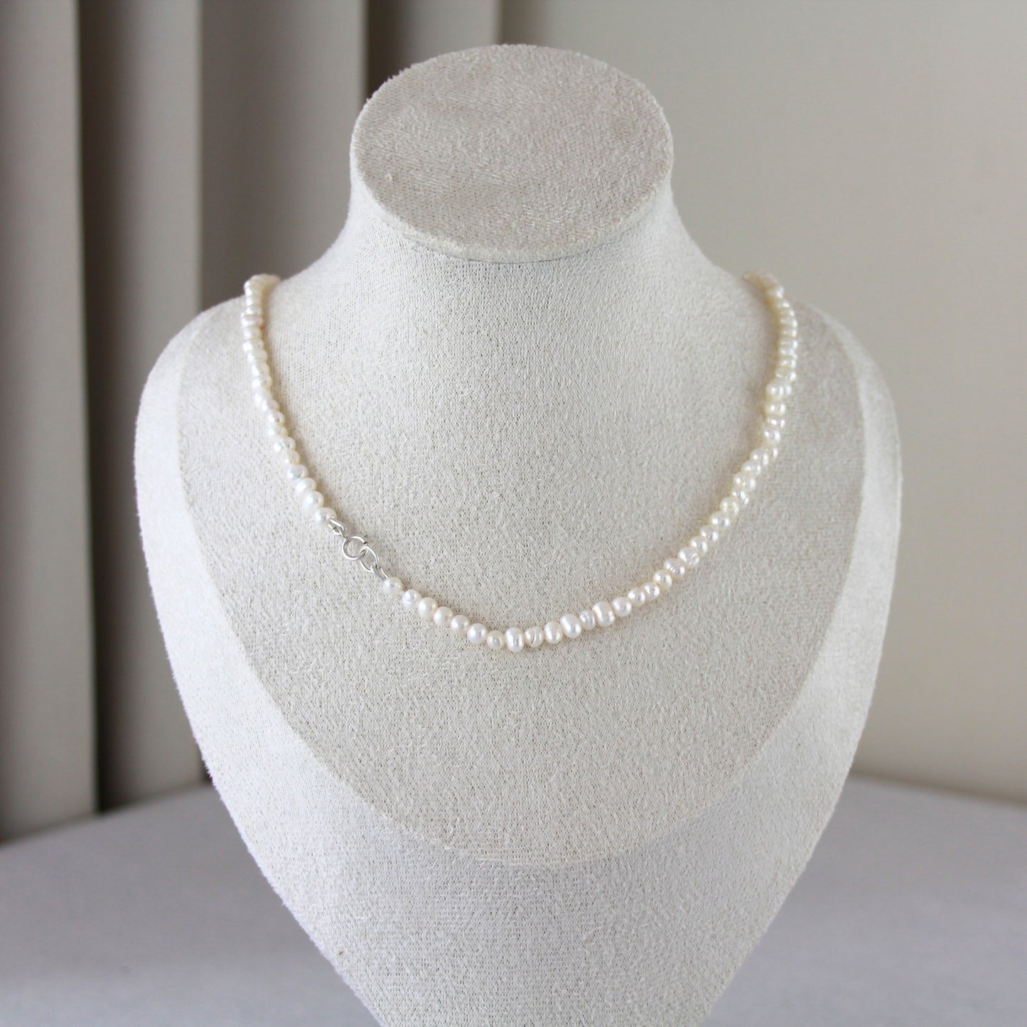 Parelketting met zilverslot