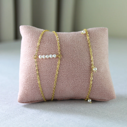Dubbele gouden schakelketting met parels