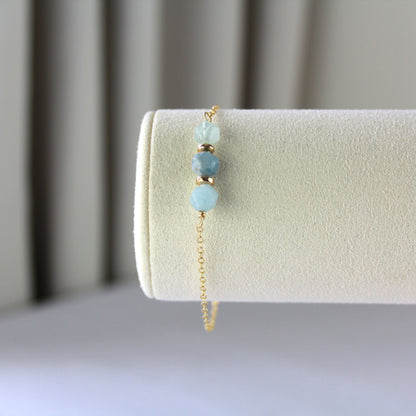 Aquamarijn armband met gouden schakel