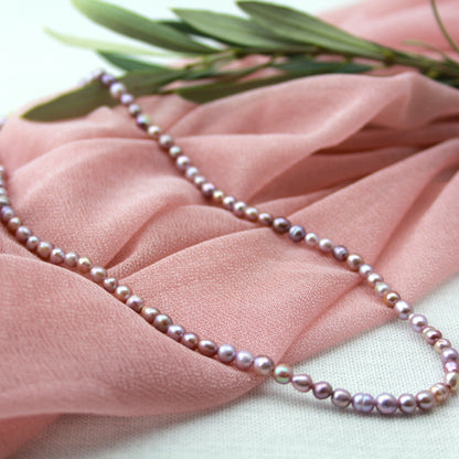 Paars parelketting met gouden slot