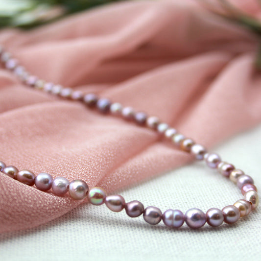 Paars parelketting met gouden slot