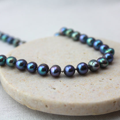 Parelketting pauwenkleur