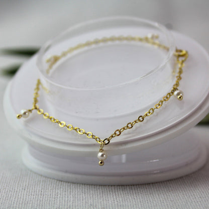 Goudenschakel ketting met parel