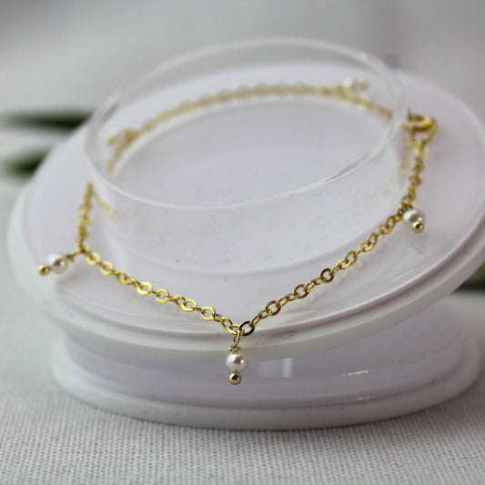 Goudenschakel ketting met parel
