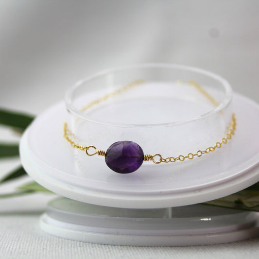 Amethist armband met gouden schakel