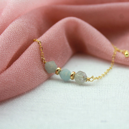 Aquamarijn armband met gouden schakel